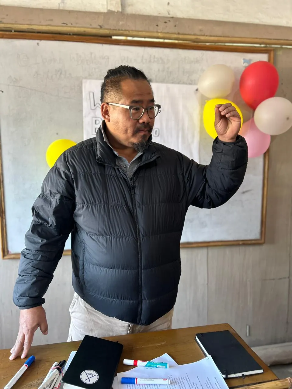 An educator leading a classroom session in Jotsoma